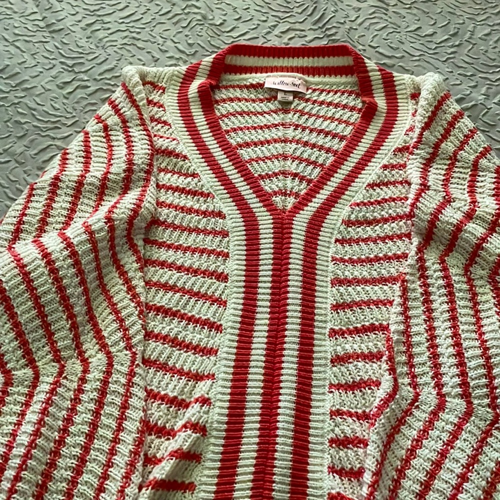 Mid waist sweater this beautiful orange and white size large never been worn new